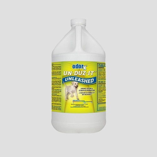 a 3.8-litre bottle of odorx un-duz-it unleashed pet urine remover on a grey background