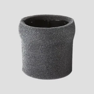 a shop-vac foam filter on a grey background