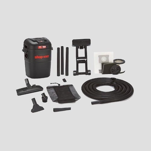 a red and black shop-vac with accessories