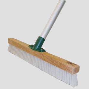 a carpet grooming pile brush with white bristles